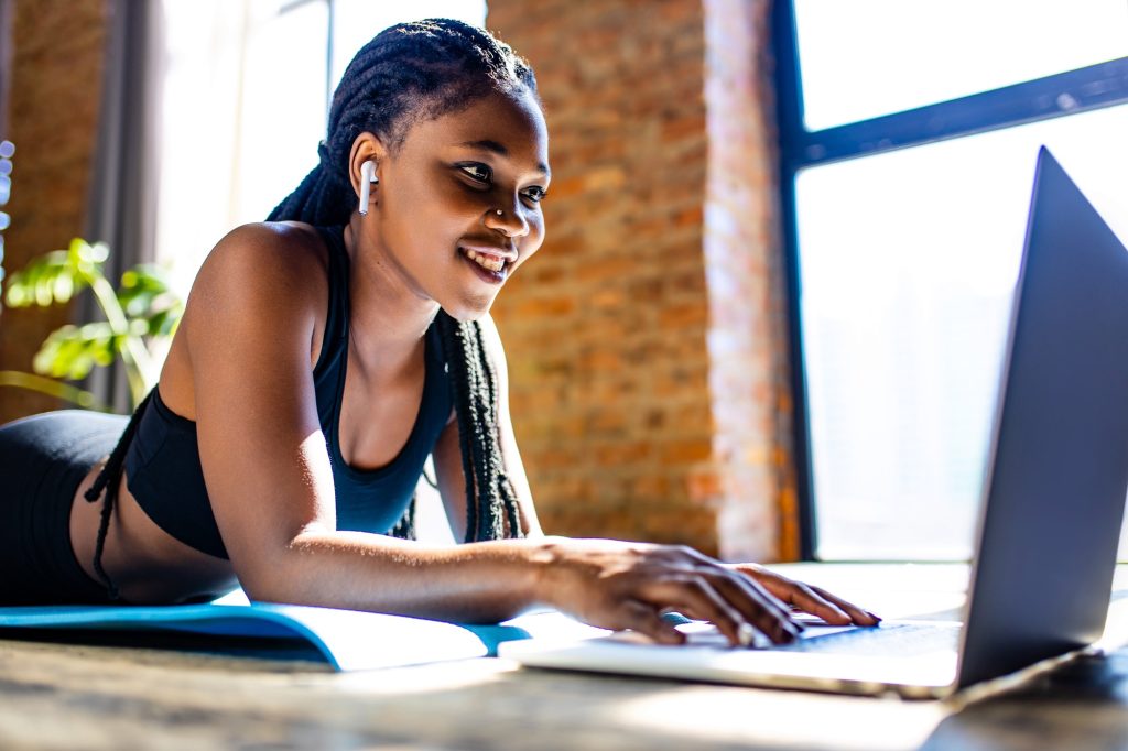 beautiful coach online blogger stream from her house against the background of panoramic windows